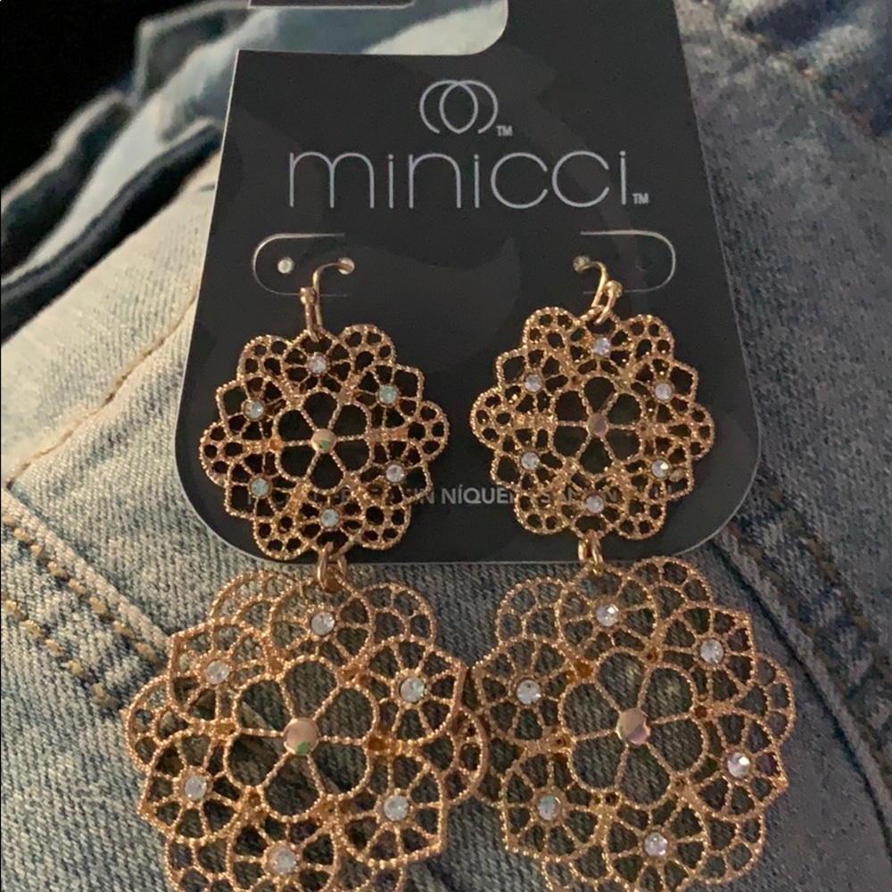Gold in color earrings with crystals